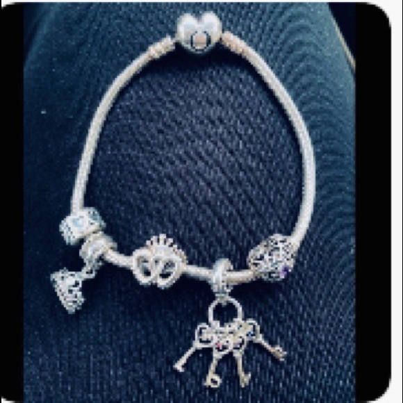 Pandora Bracelet with Charm Set Like new | Mercari 3 charms 2 clips. Silver Pandora bracelet.